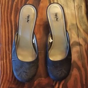 Women's black slip on low heel dress shoe